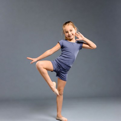 Young girl doing ballet pose