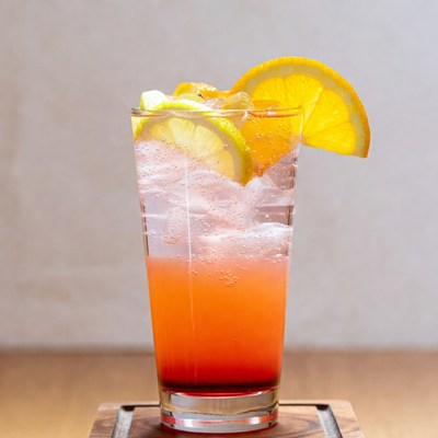 Pink Cocktail with Orange and Lime