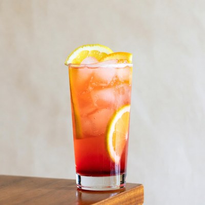 Iced Red Cocktail with Lemon Slices