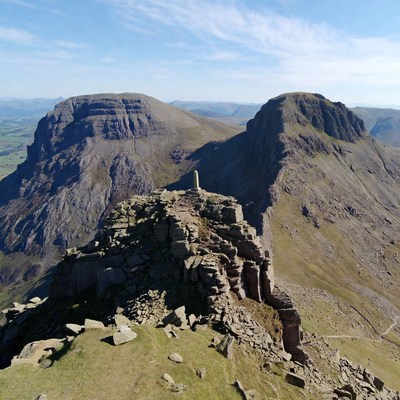 Mountain Summit with Stone Pillar