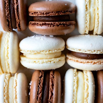 Colorful Macarons on White Surface