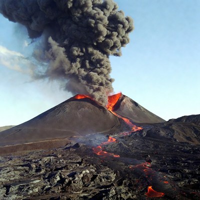 Volcano erupting with lava flow