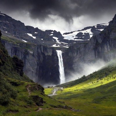 Majestic Waterfall in Snowy Mountains