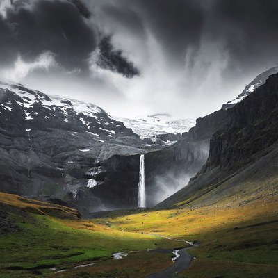 Dramatic Waterfall in Snowy Mountains