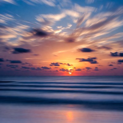 Ocean Sunset with Streaking Clouds