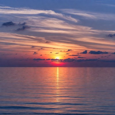 Sunset over calm ocean