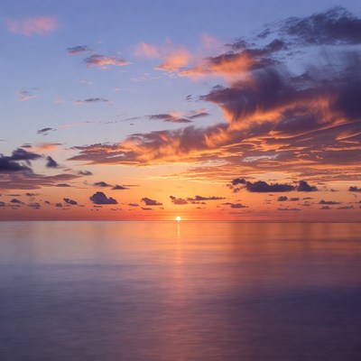 Sunset over calm ocean