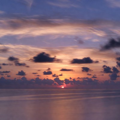 Sunrise over calm ocean