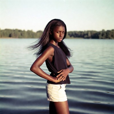 African-American girl by lake