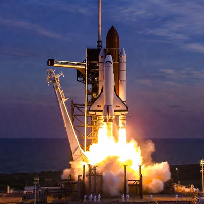 Space Shuttle Launching at Dusk