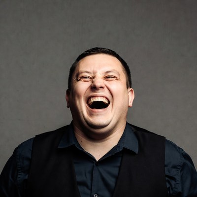 Man laughing heartily