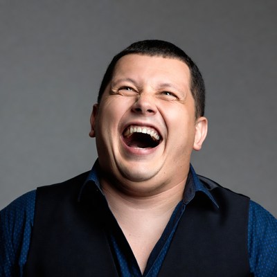 Man laughing heartily