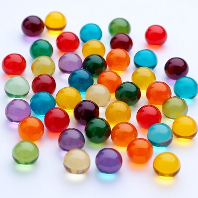 Colorful Glass Marbles on White Background