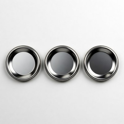 Three gradient metallic coins