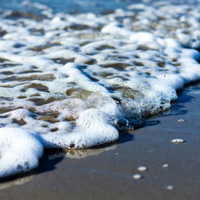 Ocean Waves Crashing on Sandy Beach