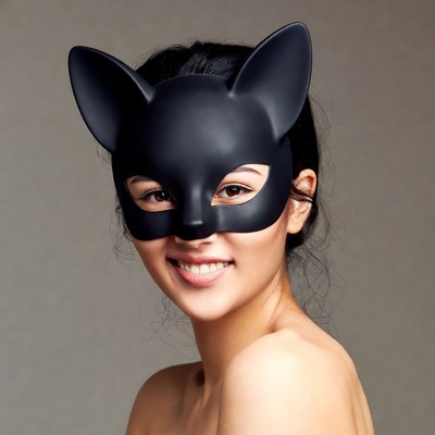 Asian woman wearing cat mask
