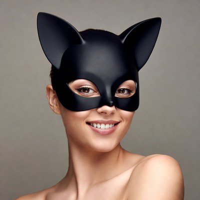 Woman wearing black cat mask