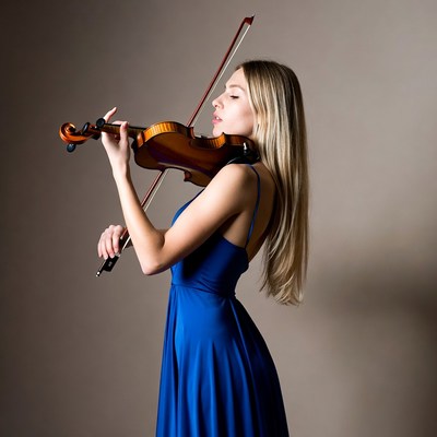 Blonde woman playing violin