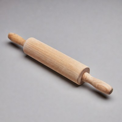 Wooden Rolling Pin on Gray Background