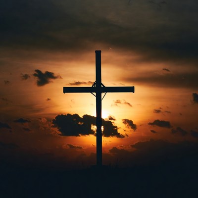 Silhouette Cross at Sunset