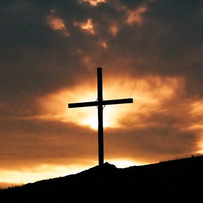 Silhouette Cross on Sunset Hill