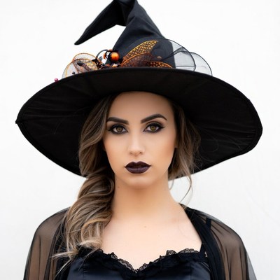 Woman wearing witch hat