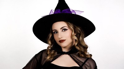 Woman in black witch hat