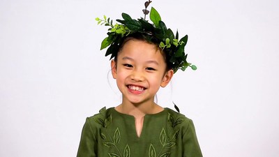 Asian girl wearing laurel wreath