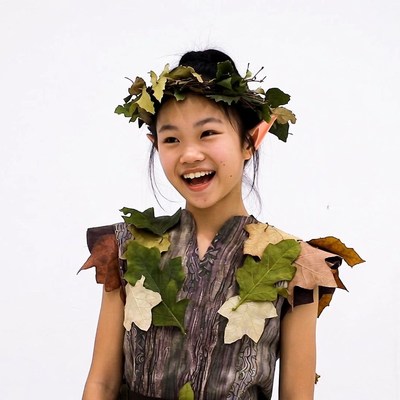 Asian girl in leaf elf costume