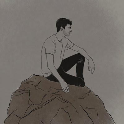 Man sitting on mountain top