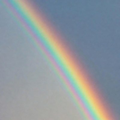 Colorful Rainbow in Blue Sky