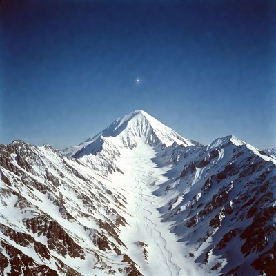 Snowy Mountaineous Peak Aerial View