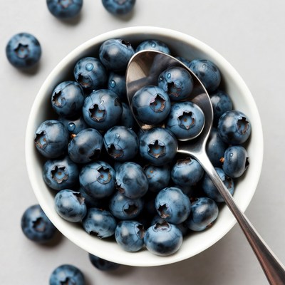 Blueberries in Bowl with Spoon