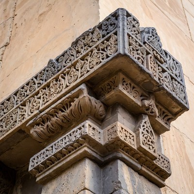 Intricate Stone Carvings on Building Corner