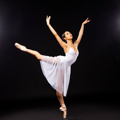 Asian ballerina performing ballet pose
