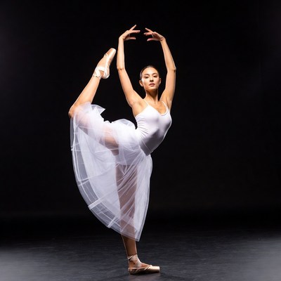 Asian ballerina performing leg split pose
