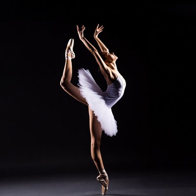 Ballerina performing high leg split pose