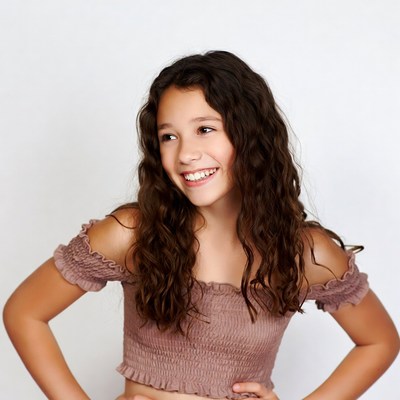 Smiling girl with curly hair
