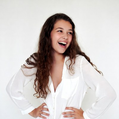 Smiling girl with curly hair