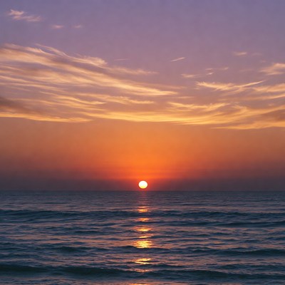 Sunset over ocean with reflection
