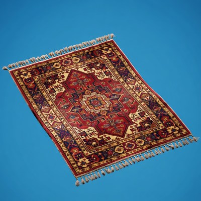 Red Oriental Rug on Blue Background
