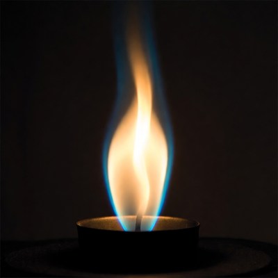Blue flame burning in candle