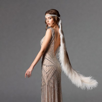 Woman in Beaded Flapper Dress with Feather Boa