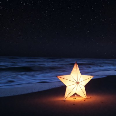 Illuminated Star Lantern on Beach