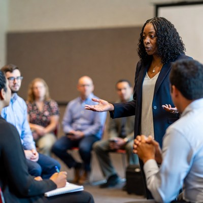 African-American woman leading group discussion