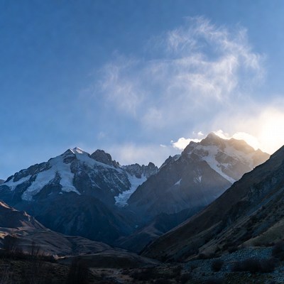 Snowy Mountains Under Blue Sky