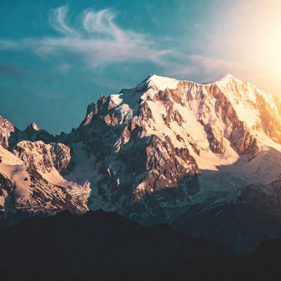Snowy Mountain Peak at Sunset