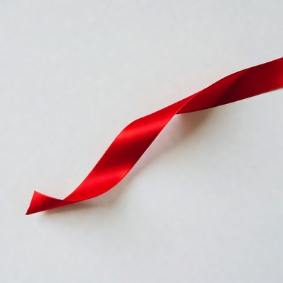 Red ribbon on white background