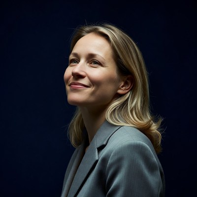 Smiling woman in gray suit