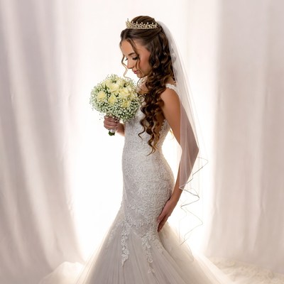 Bride holding white bouquet